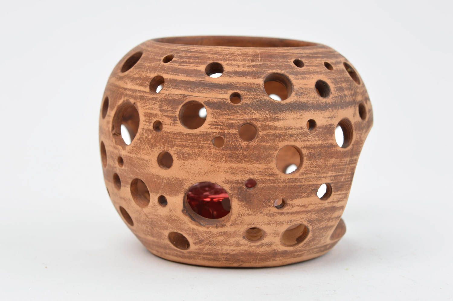 Глиняный подсвечник круглый в форме шара с отверстиями для декора ручной работы фото 2