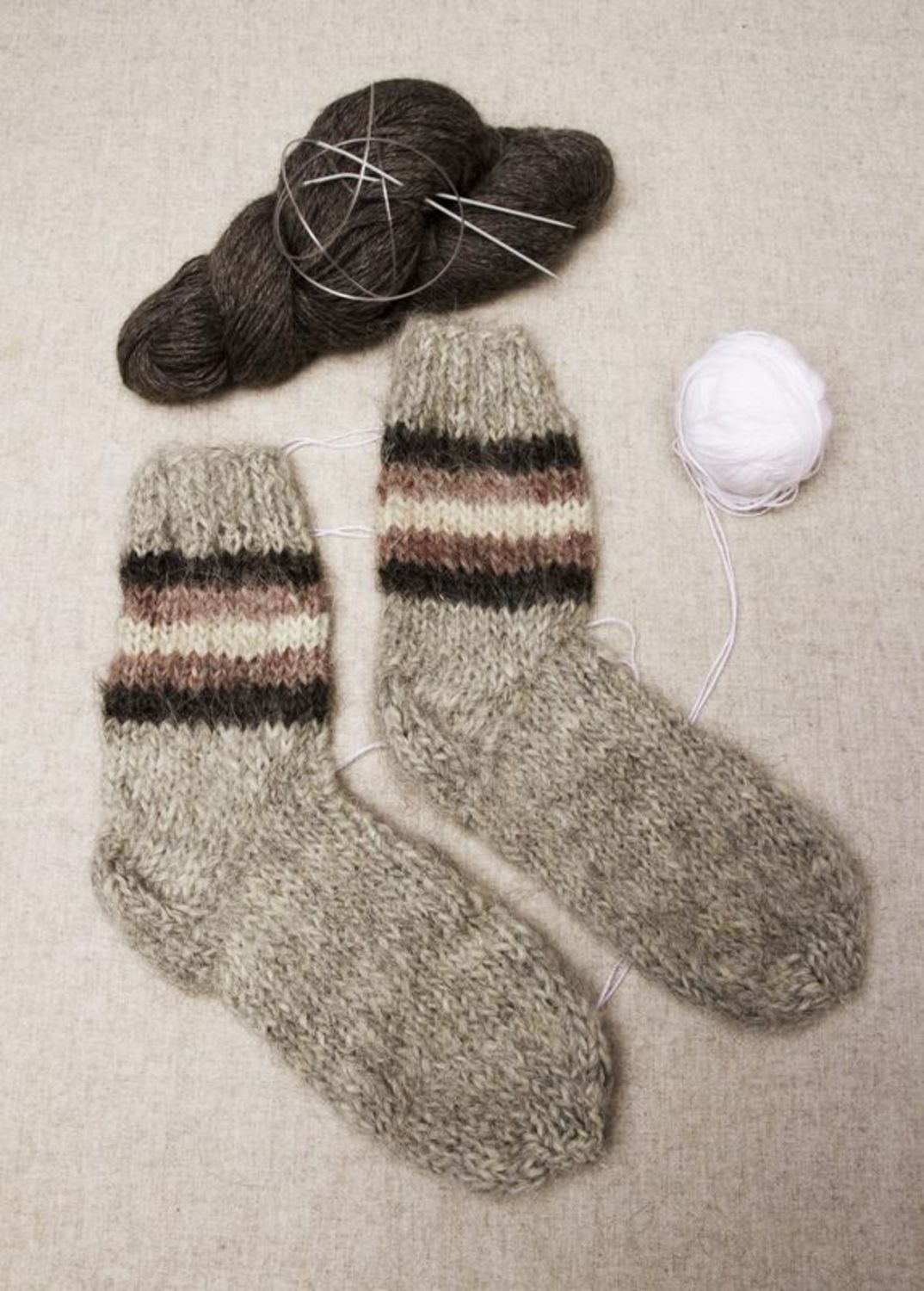 Handmade wool socks of grey color photo 1