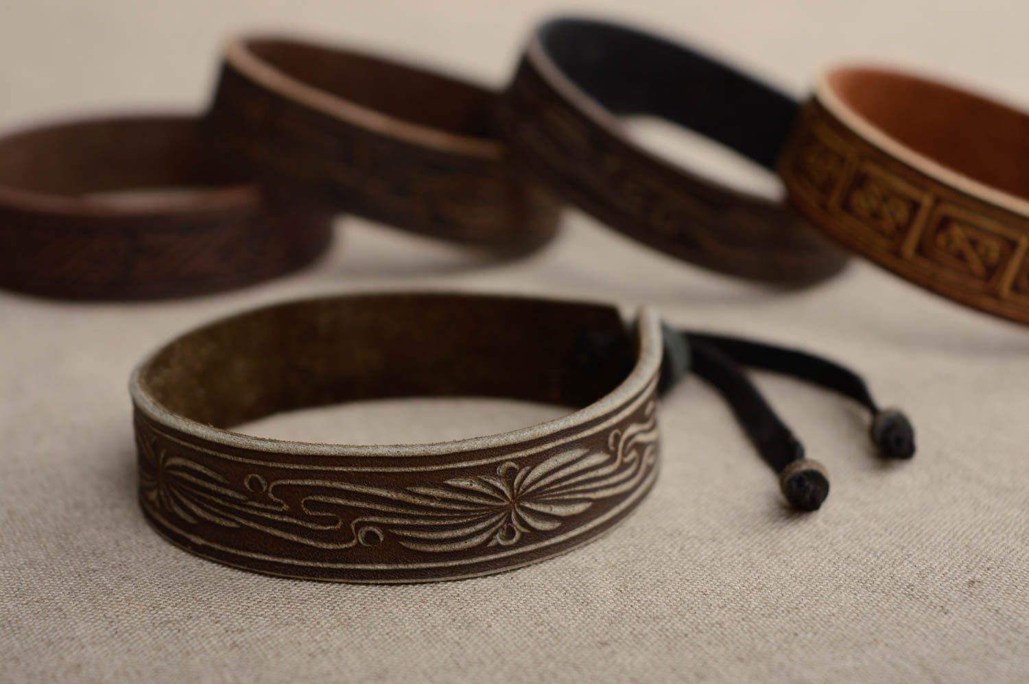 Dark carved leather bracelet photo 2