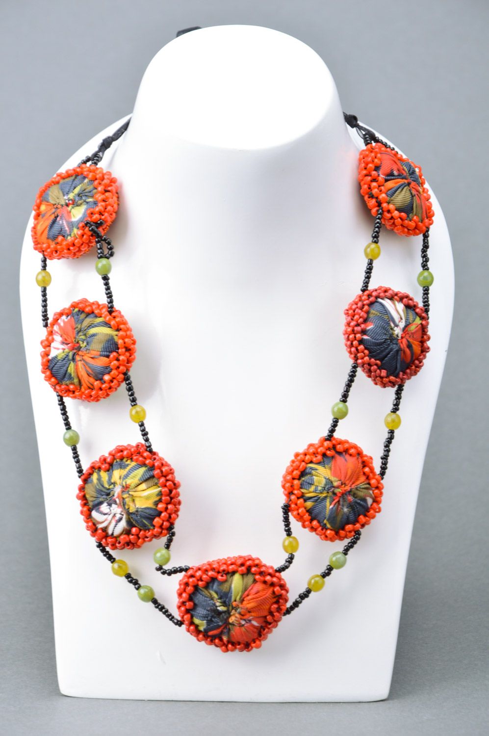Unusual handmade massive women's necklace woven of beads and fabric photo 1