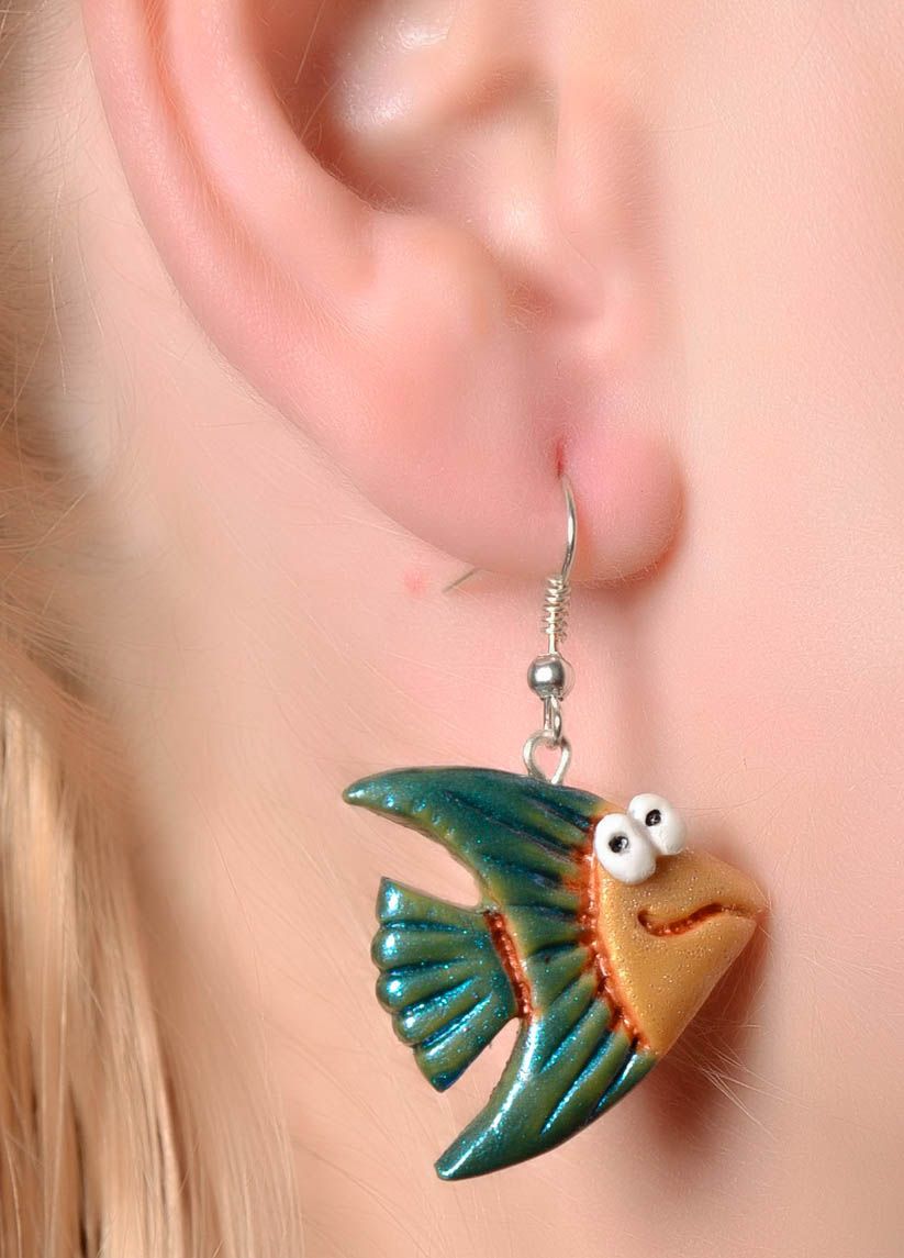 Earrings in the shape of fishes photo 4