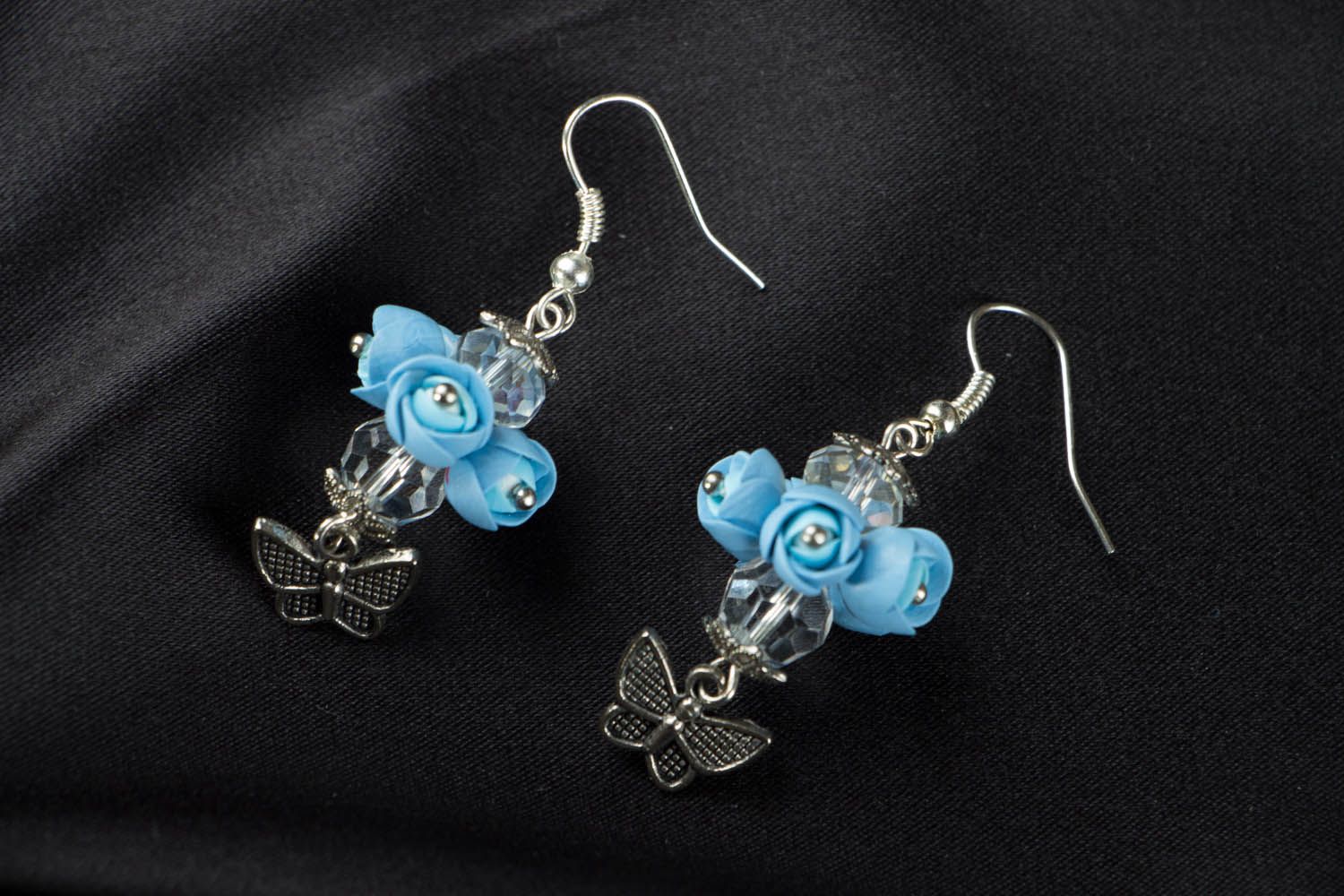 Blaue Ohrringe mit Blumen und Schmetterlingen  foto 1