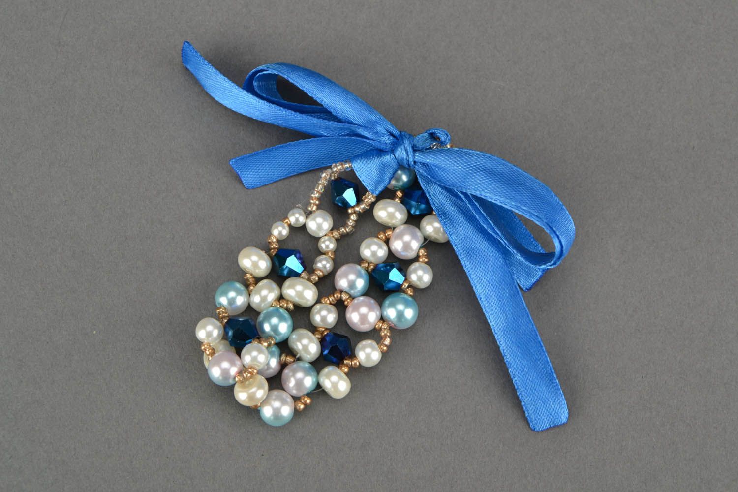 Bracelet de perles artificielles avec ruban bleu photo 4