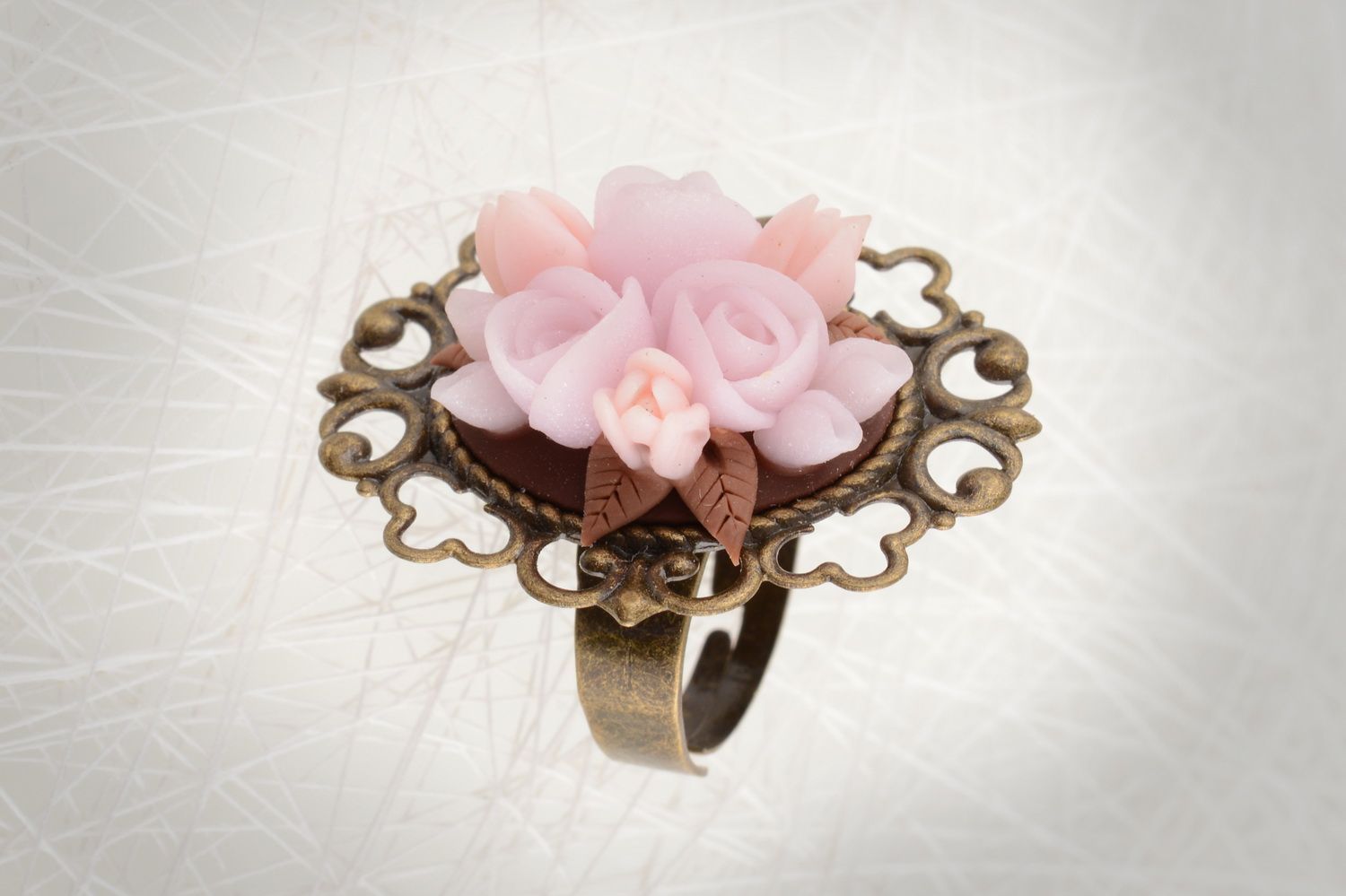 Handmade jewelry ring with figured metal basis and pink polymer clay flowers photo 1