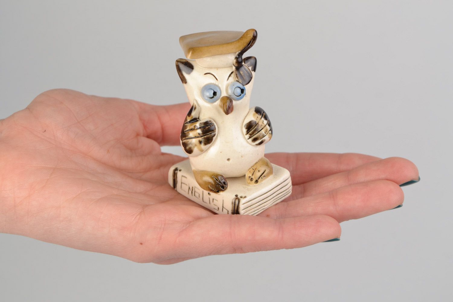 Handmade small cute ceramic figurine of owl in graduate cap painted with glaze photo 2
