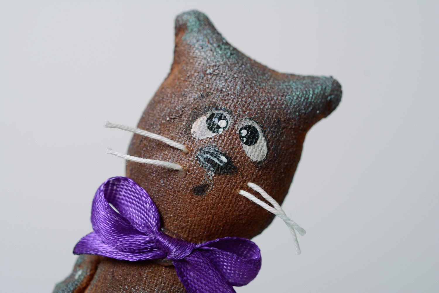Handmade designer soft toy soaked with coffee in the shape of cat with bow photo 2