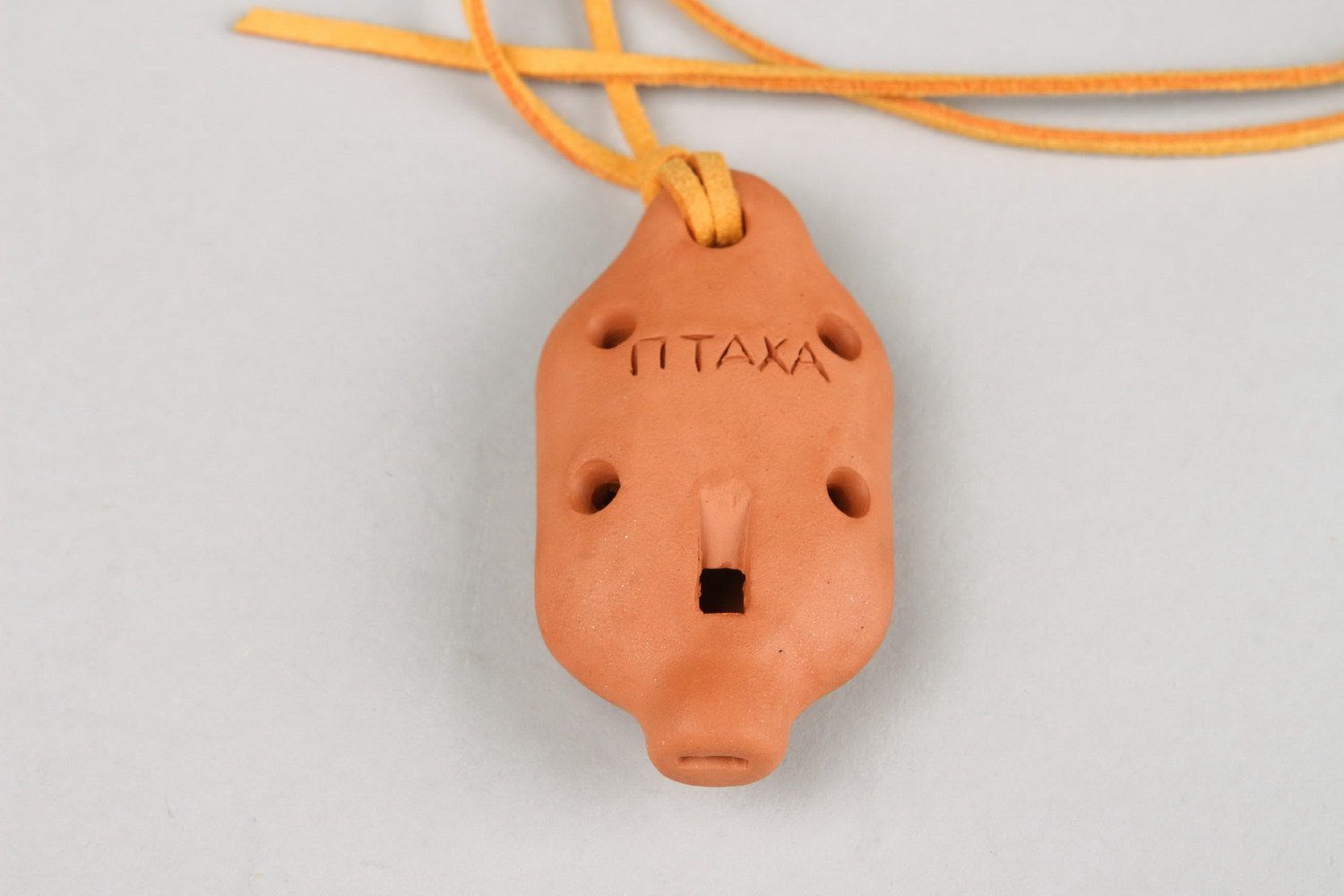 Tin whistle pendant made of clay with flower photo 3