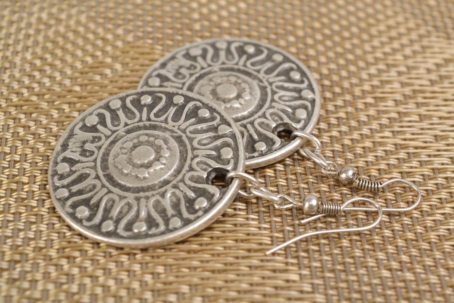 Round ethnic metal earrings with ornament photo 1