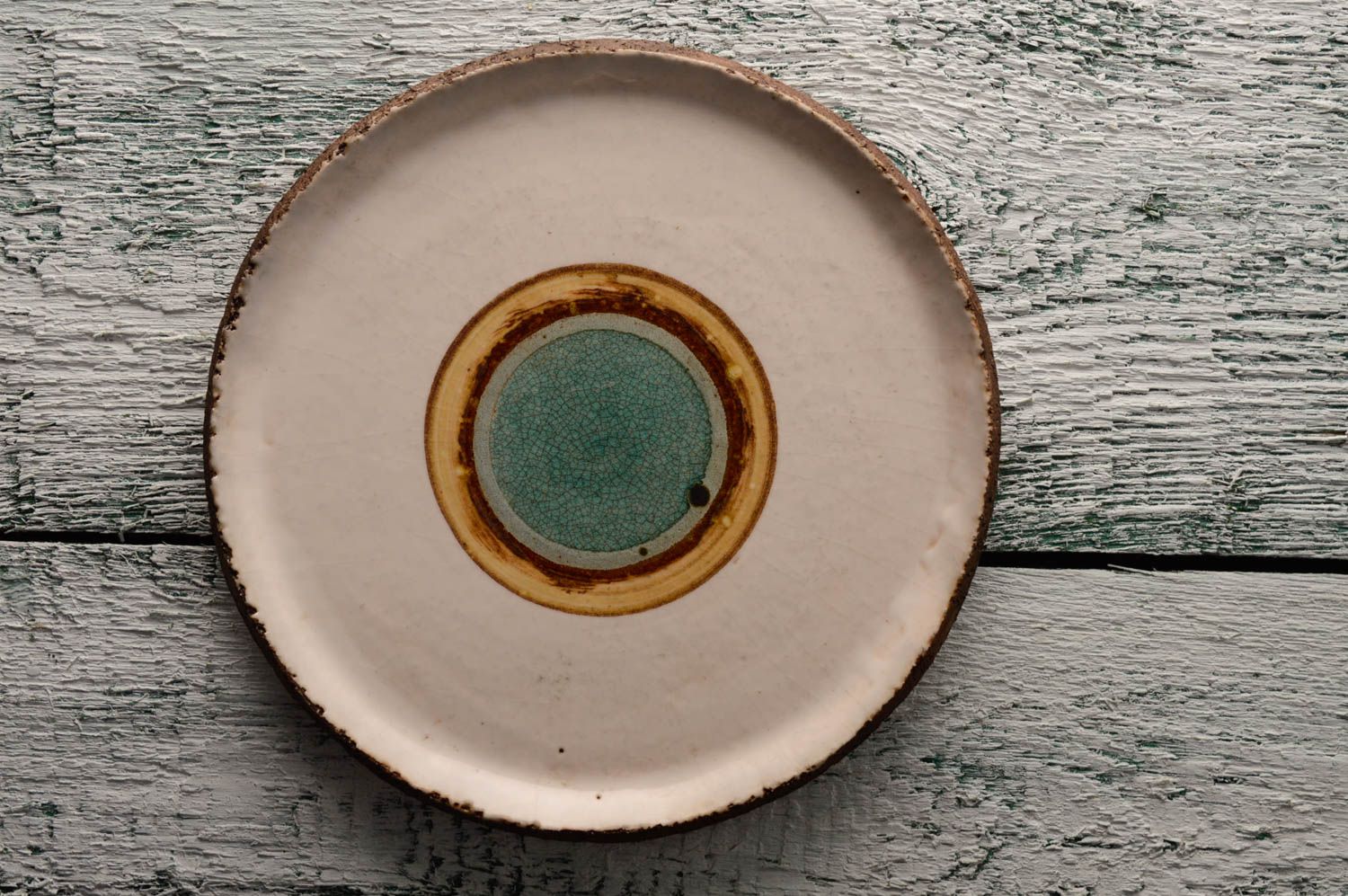 Керамическая тарелка из шамотной глины плоская фото 1