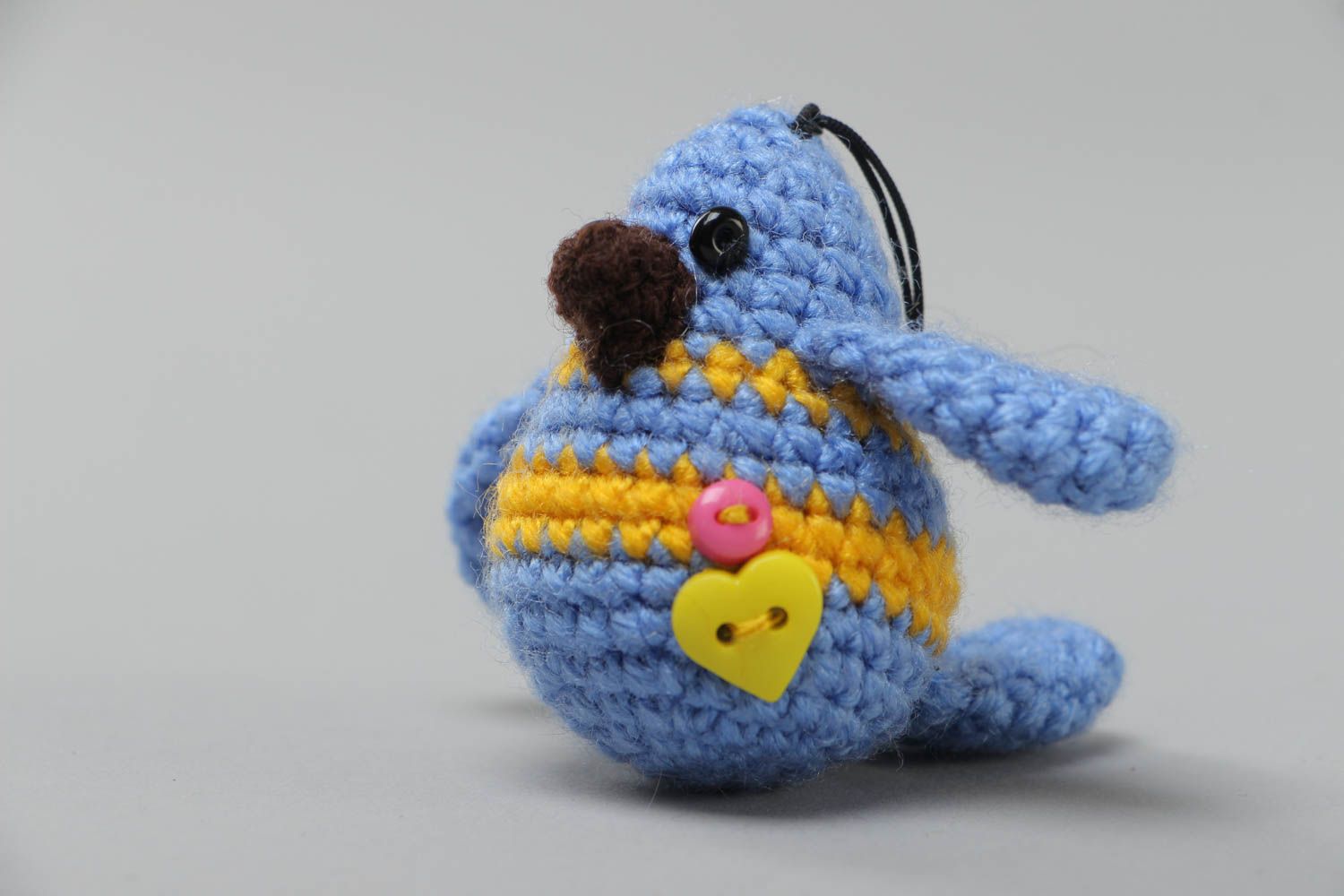 Handmade small soft toy keychain crocheted of acrylic threads blue yellow bird photo 2
