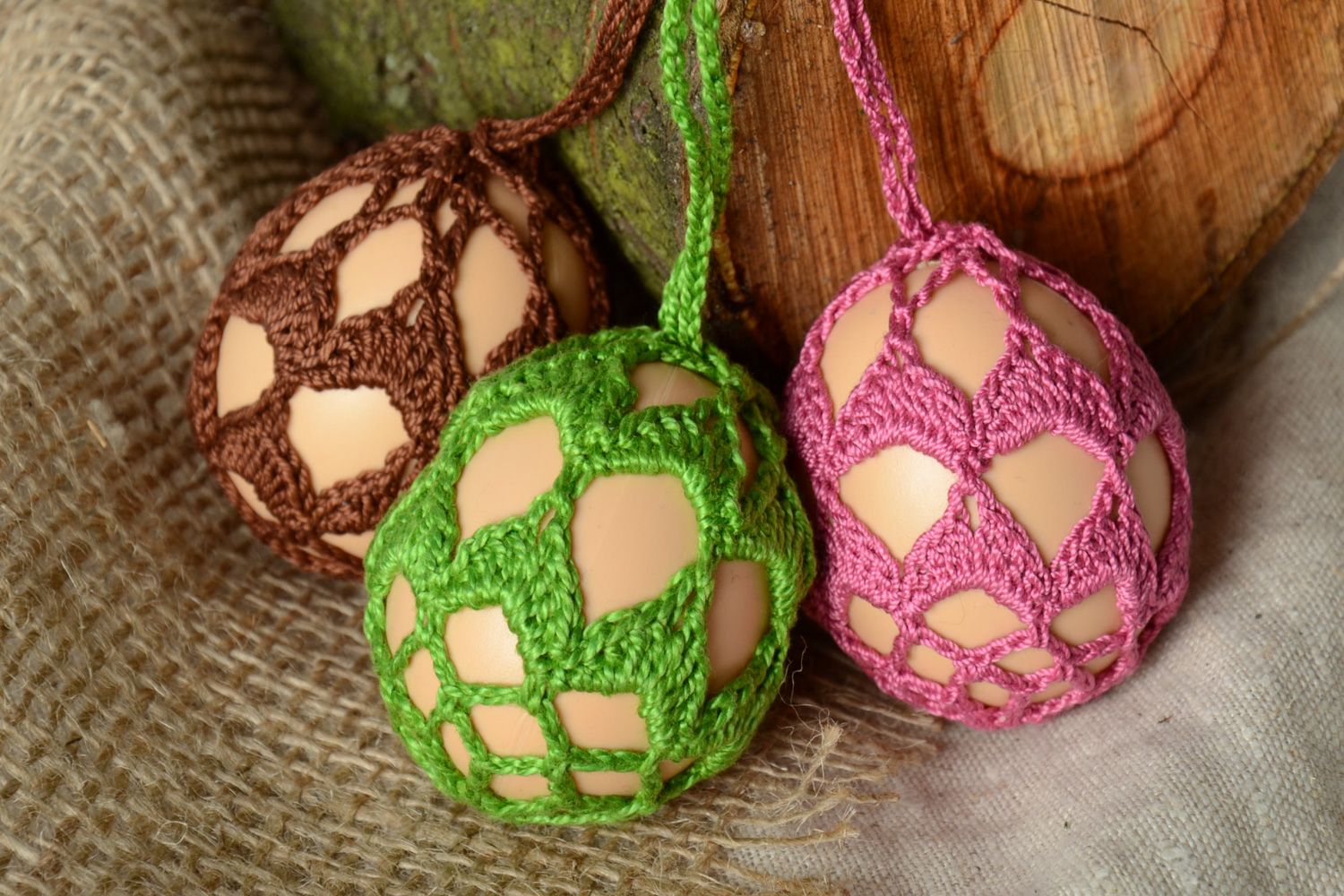 Colorful decorative handmade Easter eggs crochet over with threads 3 items photo 1