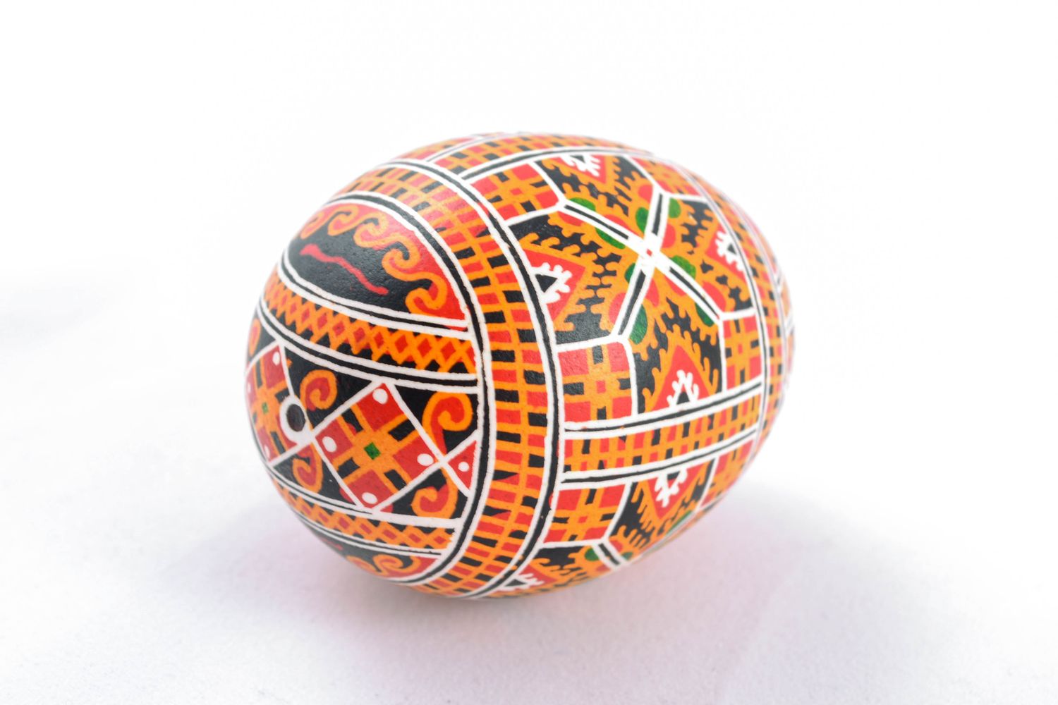Painted Easter egg with rich pattern photo 3
