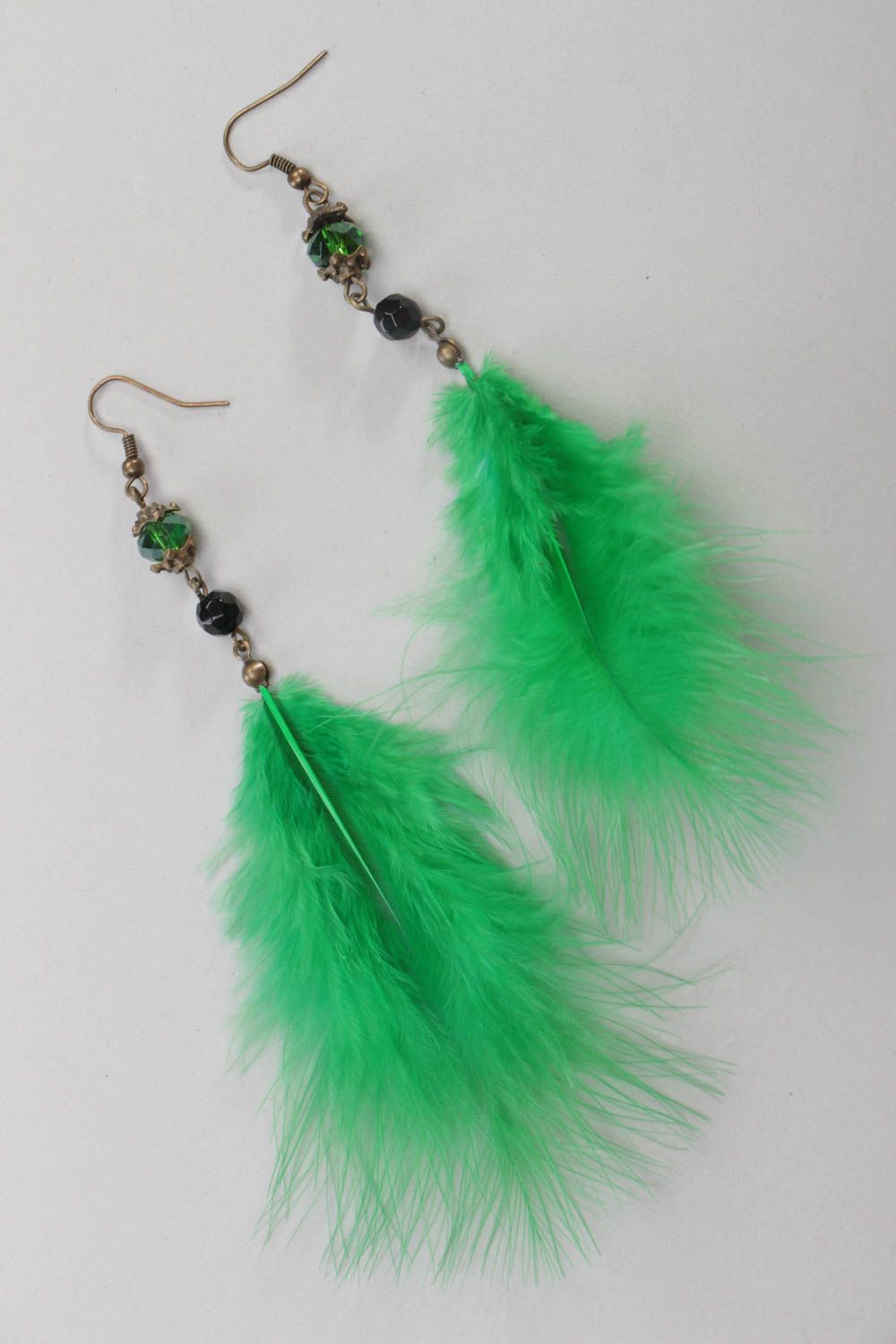 Green long earrings bright designer jewelry accessories made of feathers photo 1