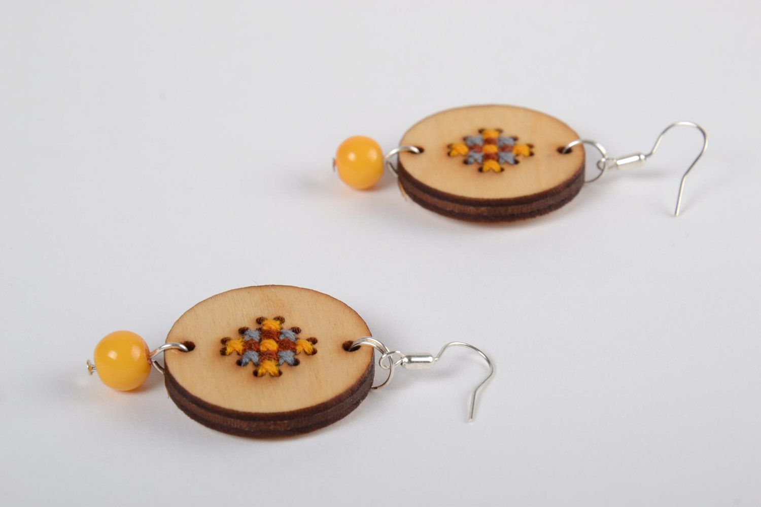 Handmade round plywood earrings with cross-stitch embroidery in eco style photo 2