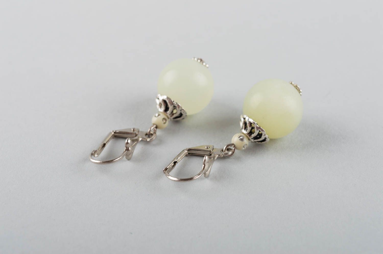Beautiful handmade elegant brass earrings with natural nephrite stone white photo 4