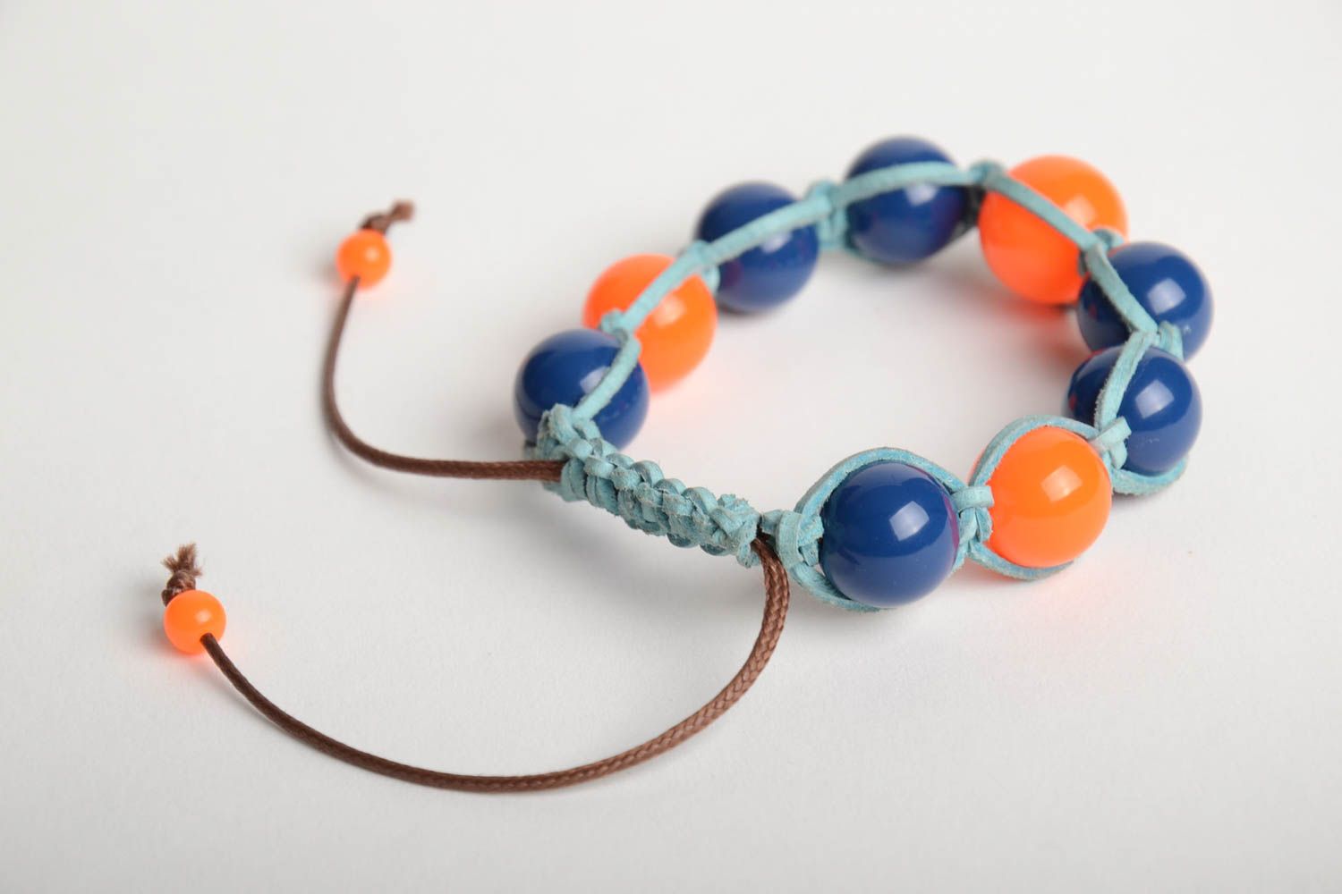 Handmade wrist bracelet woven of blue waxed cord and colorful plastic beads photo 5