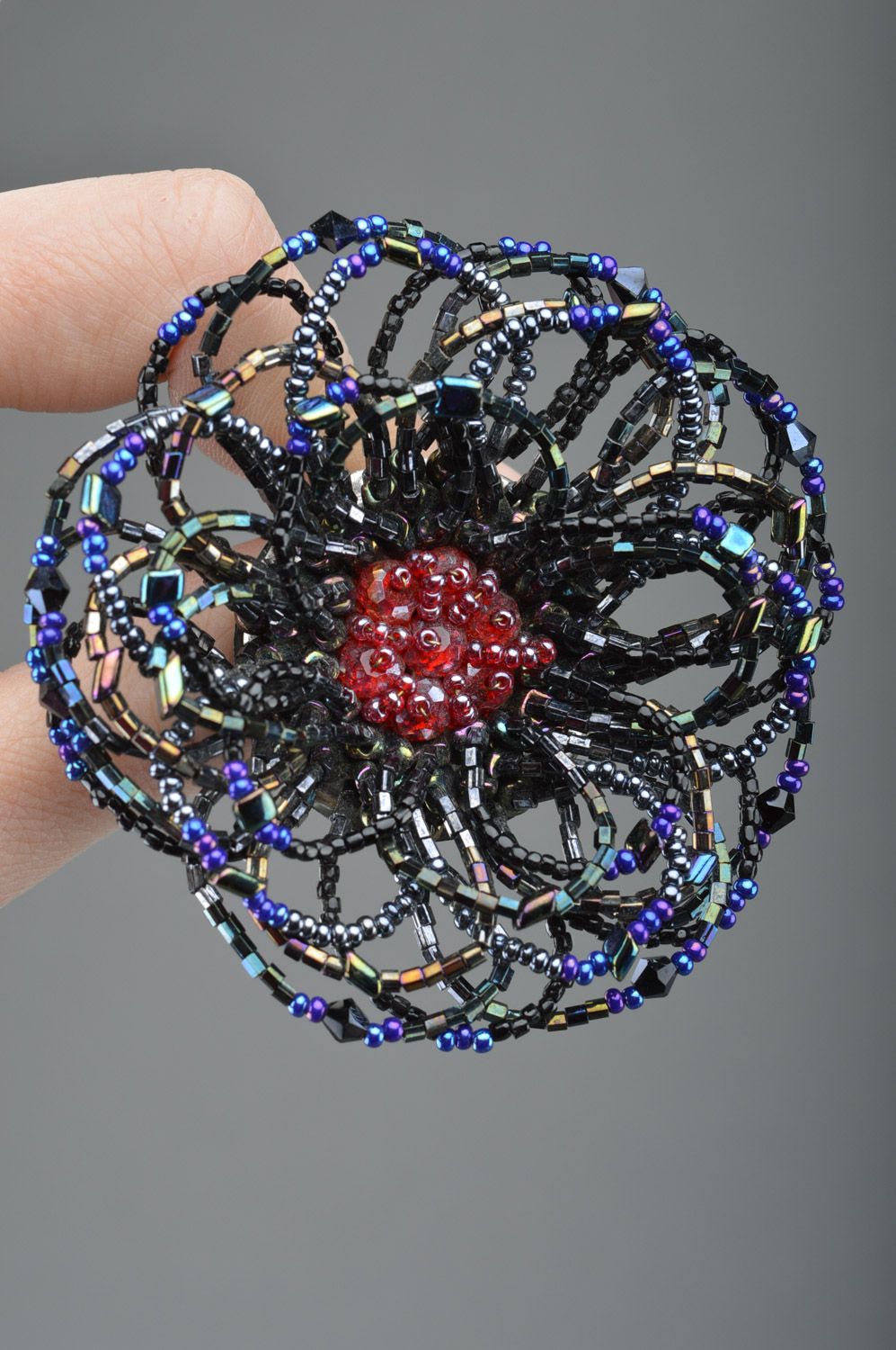 Handmade beaded flower brooch of dark color and average size woven with fishing line photo 1
