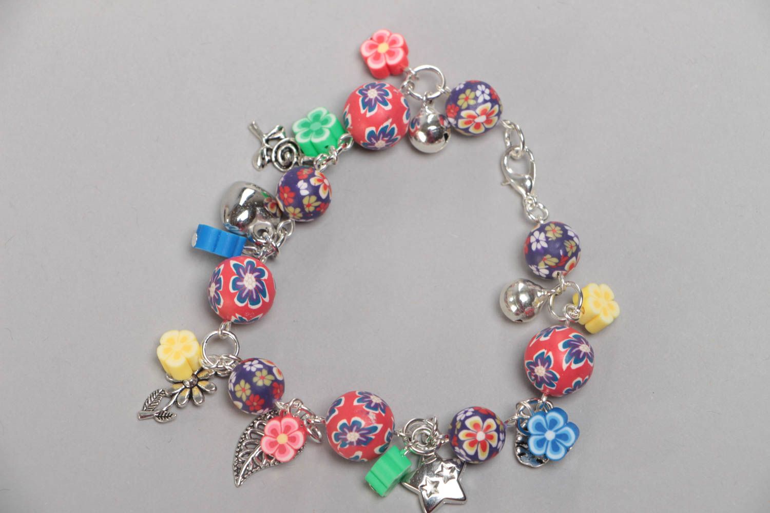 Bright handmade children's polymer clay wrist bracelet with beads and charms photo 3