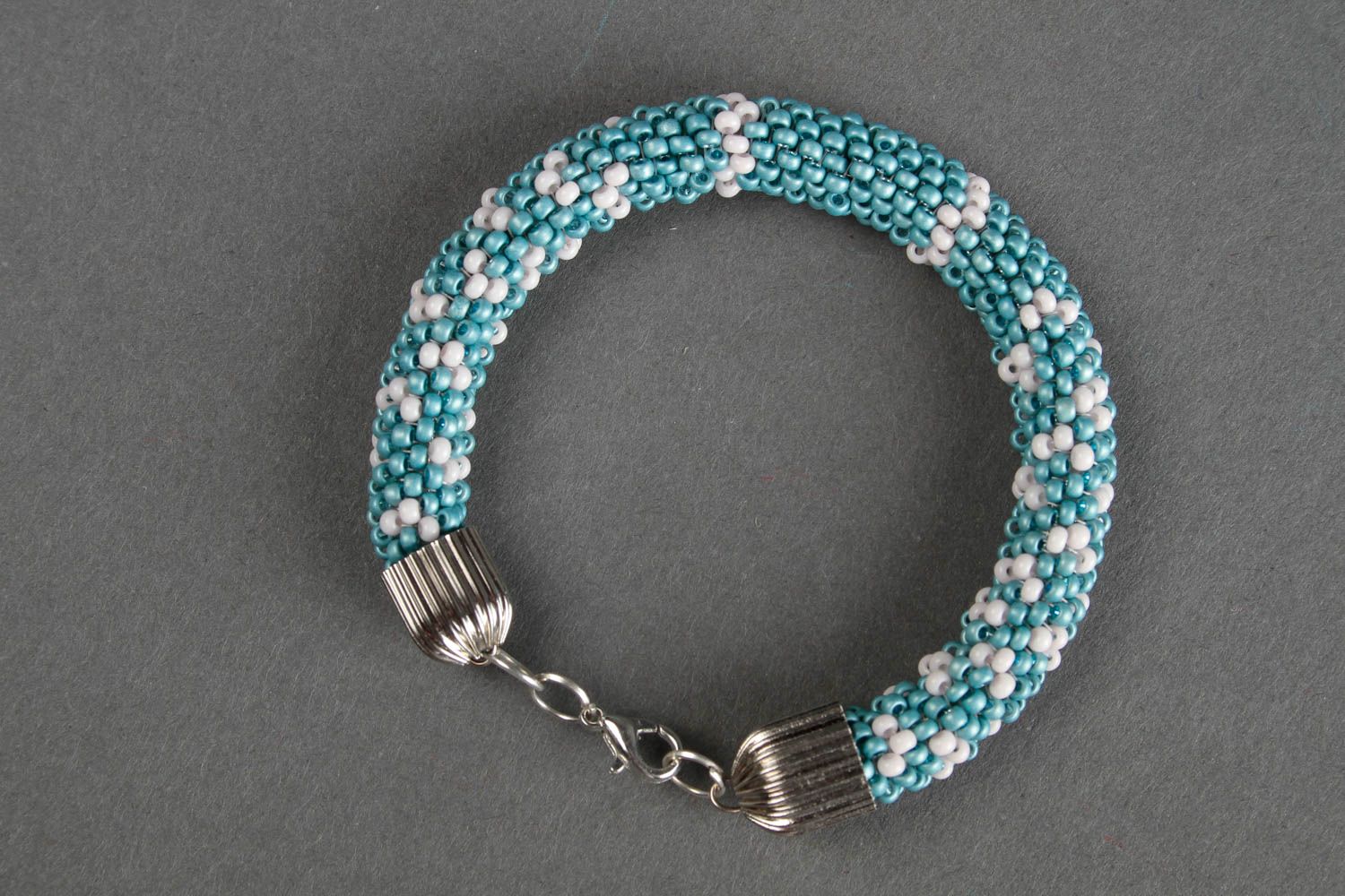 Handmade beaded cord bracelet in turquoise and white beads photo 5