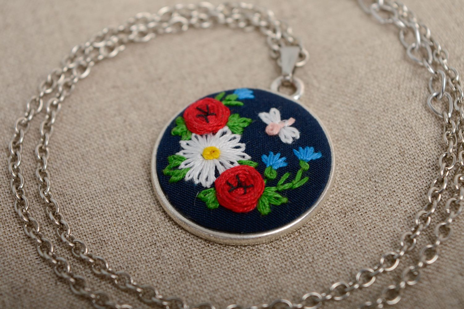 Handmade embroidered pendant with flowers photo 1