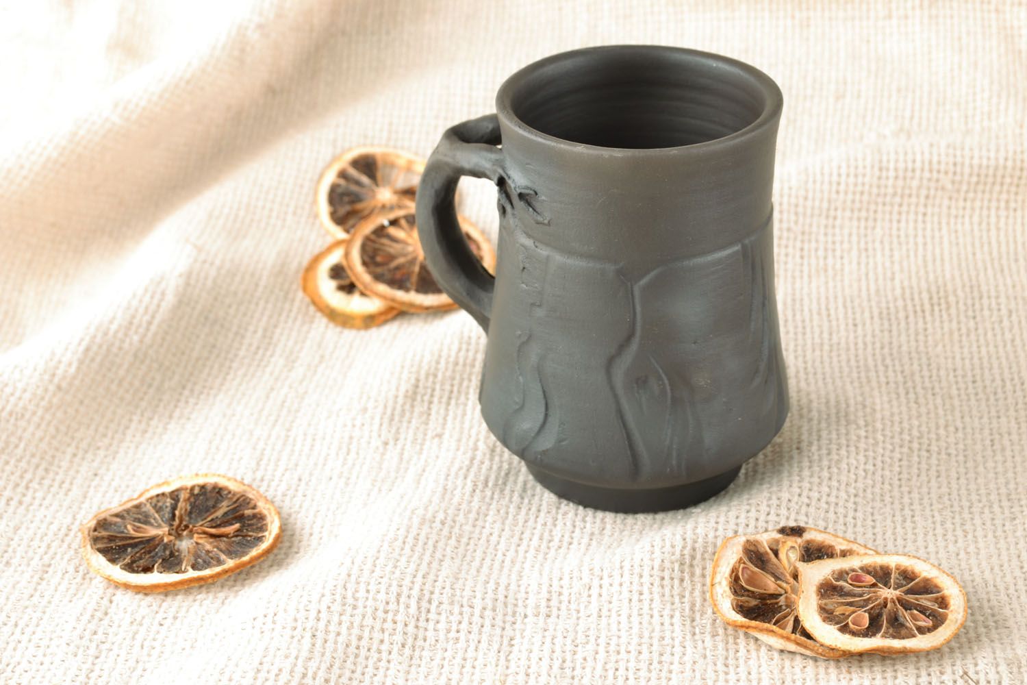Black clay natural smoked cup with handle and autumn molded leaves pattern photo 5