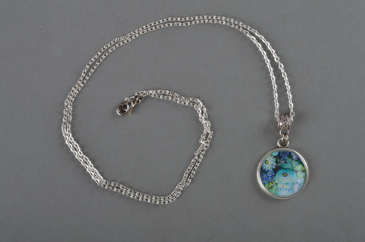 Handmade silver colored decoupage round pendant necklace with jewelry resin photo 1