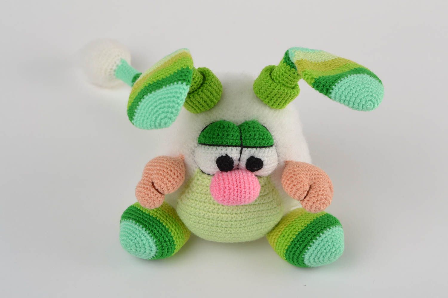 Handmade designer soft toy crocheted of acrylic threads green striped rabbit photo 3