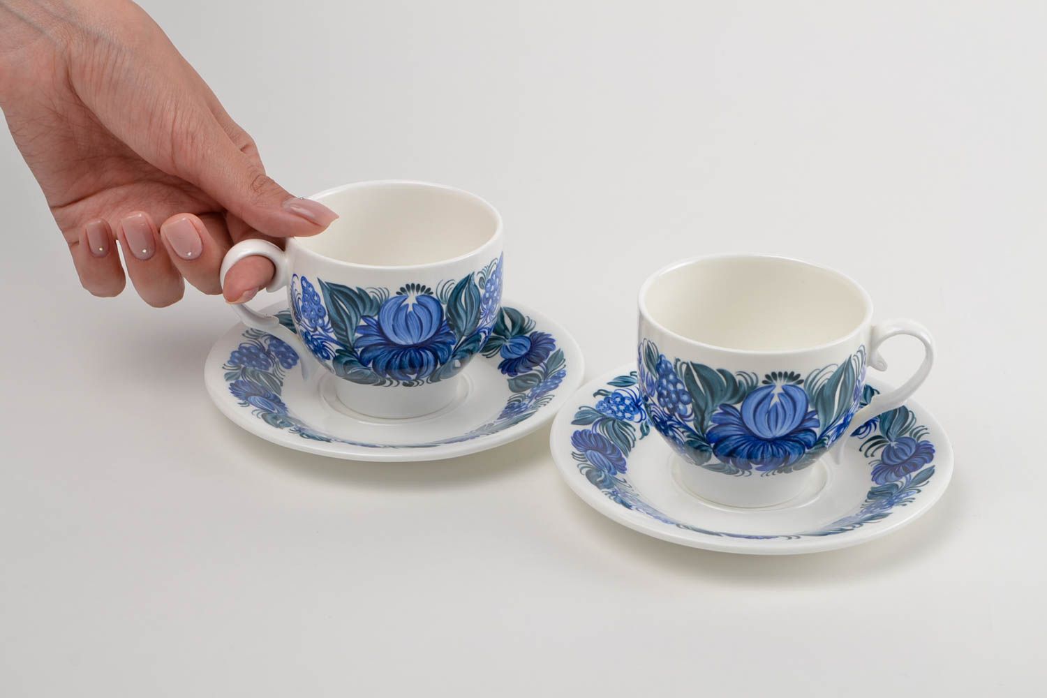 Set of two porcelain white and blue 5 oz tea cups and saucers with floral pattern photo 2