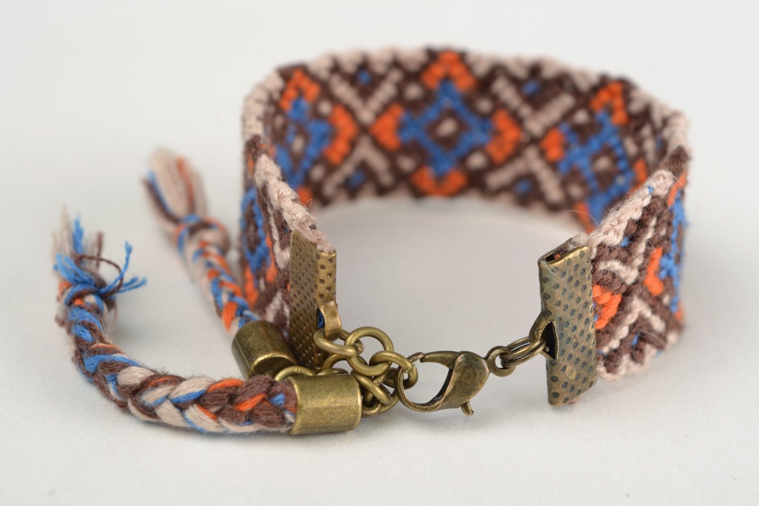 Handmade friendship macrame woven wrist bracelet with colorful ornament photo 4