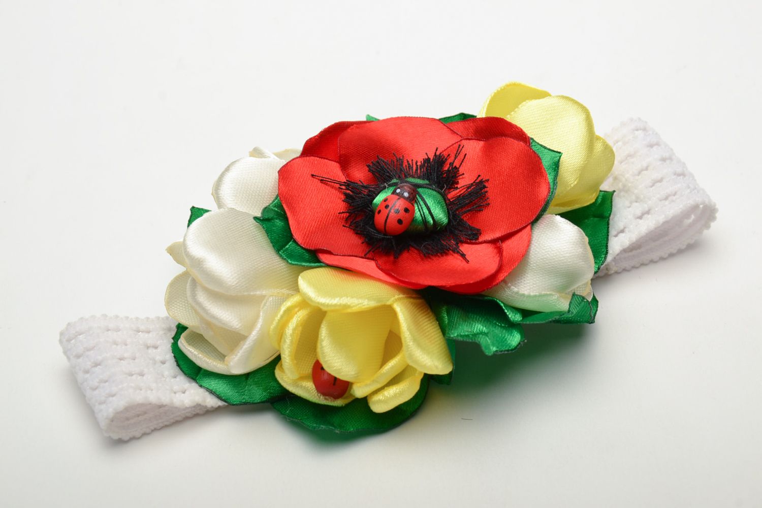 Handgemachtes Haarband mit Blumen foto 1