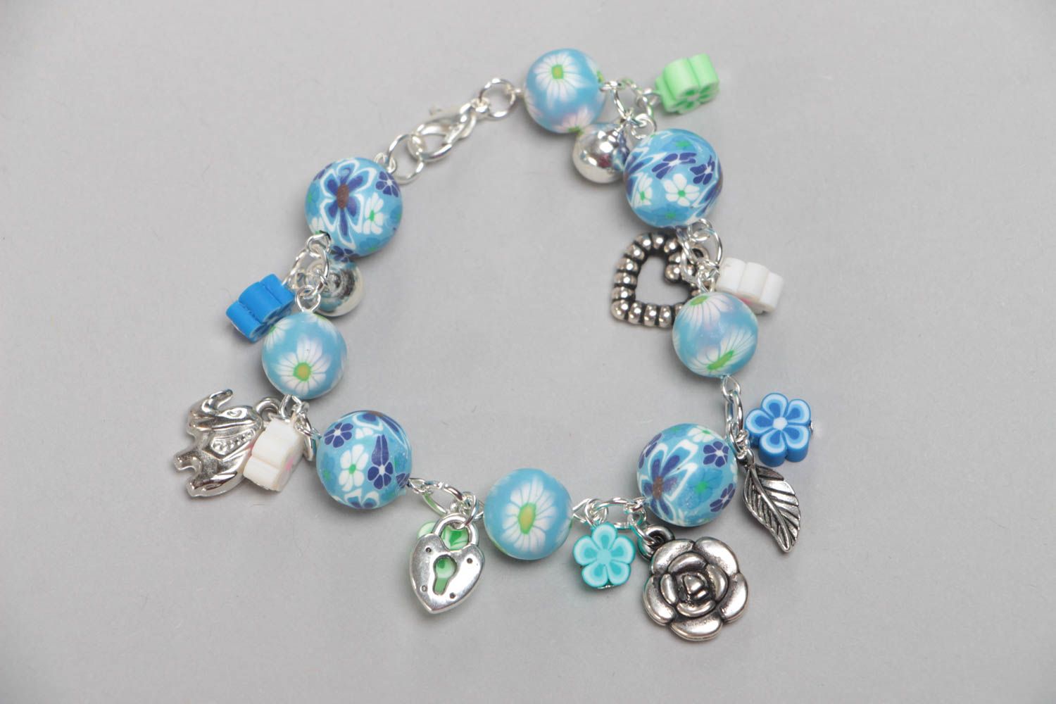Beautiful handmade designer children's polymer clay bracelet with charms photo 3