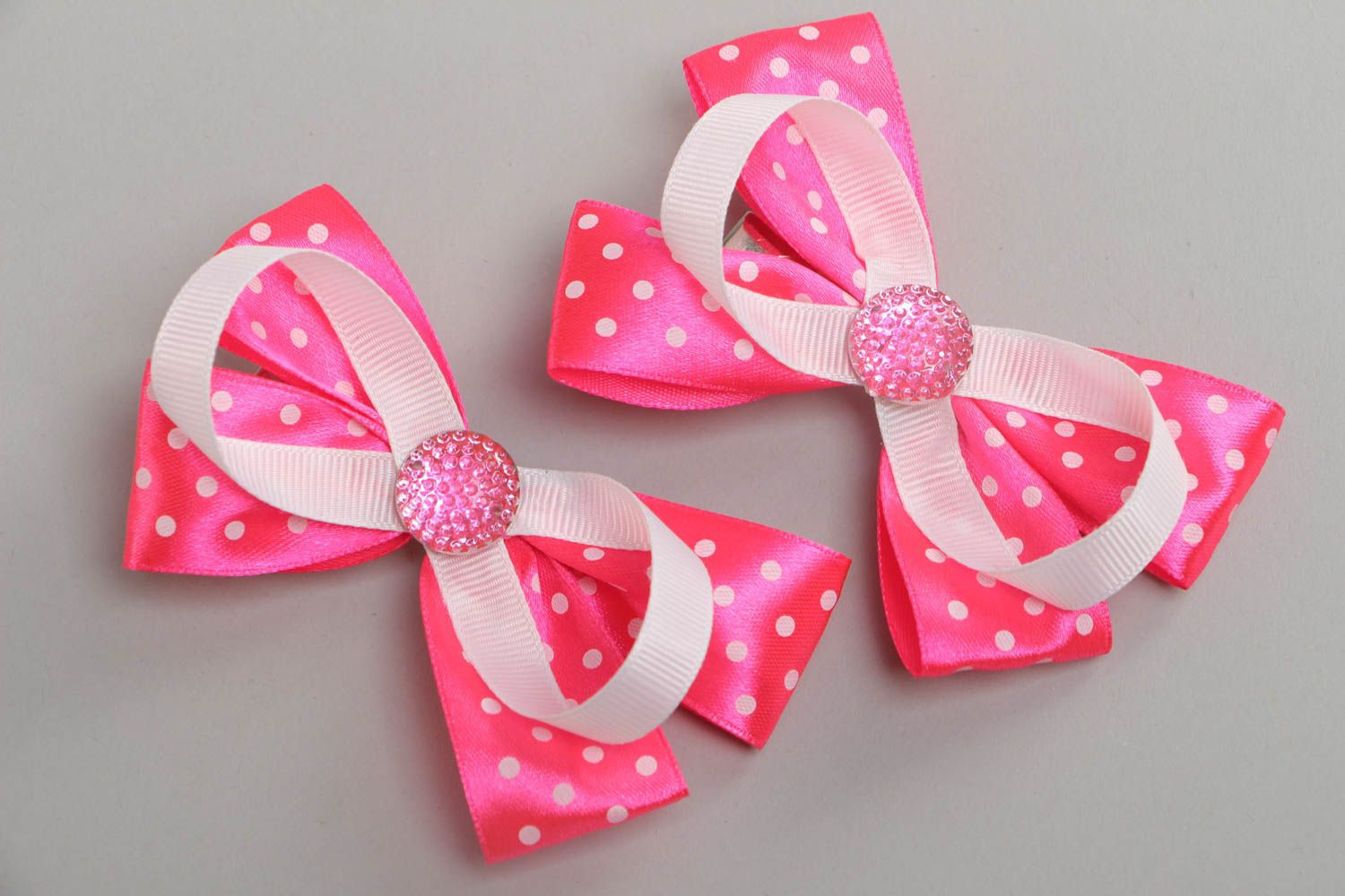 A set of 2 handmade designer bobby pins made of satin ribbon in the form of pink bows photo 2