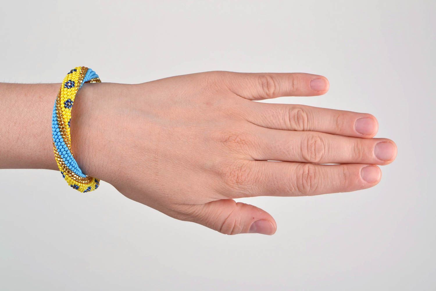 Bracelet spirale Bijou fait main Cadeau femme en perles de rocaille jaune bleu photo 1