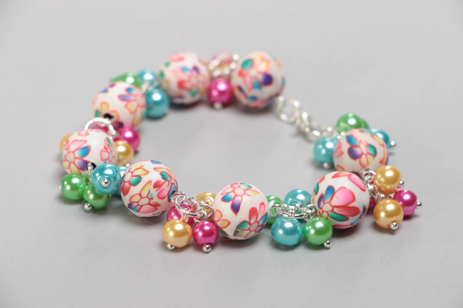 Handmade children's design polymer clay bracelet with ceramic pearls photo 2