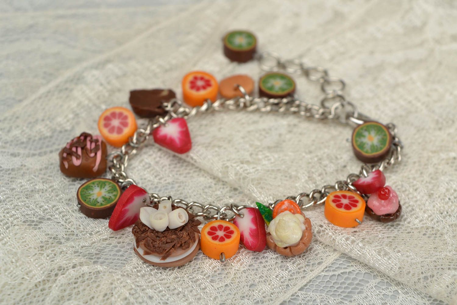 Handmade bracelet made of polymer clay on chain with decorative sweets photo 2
