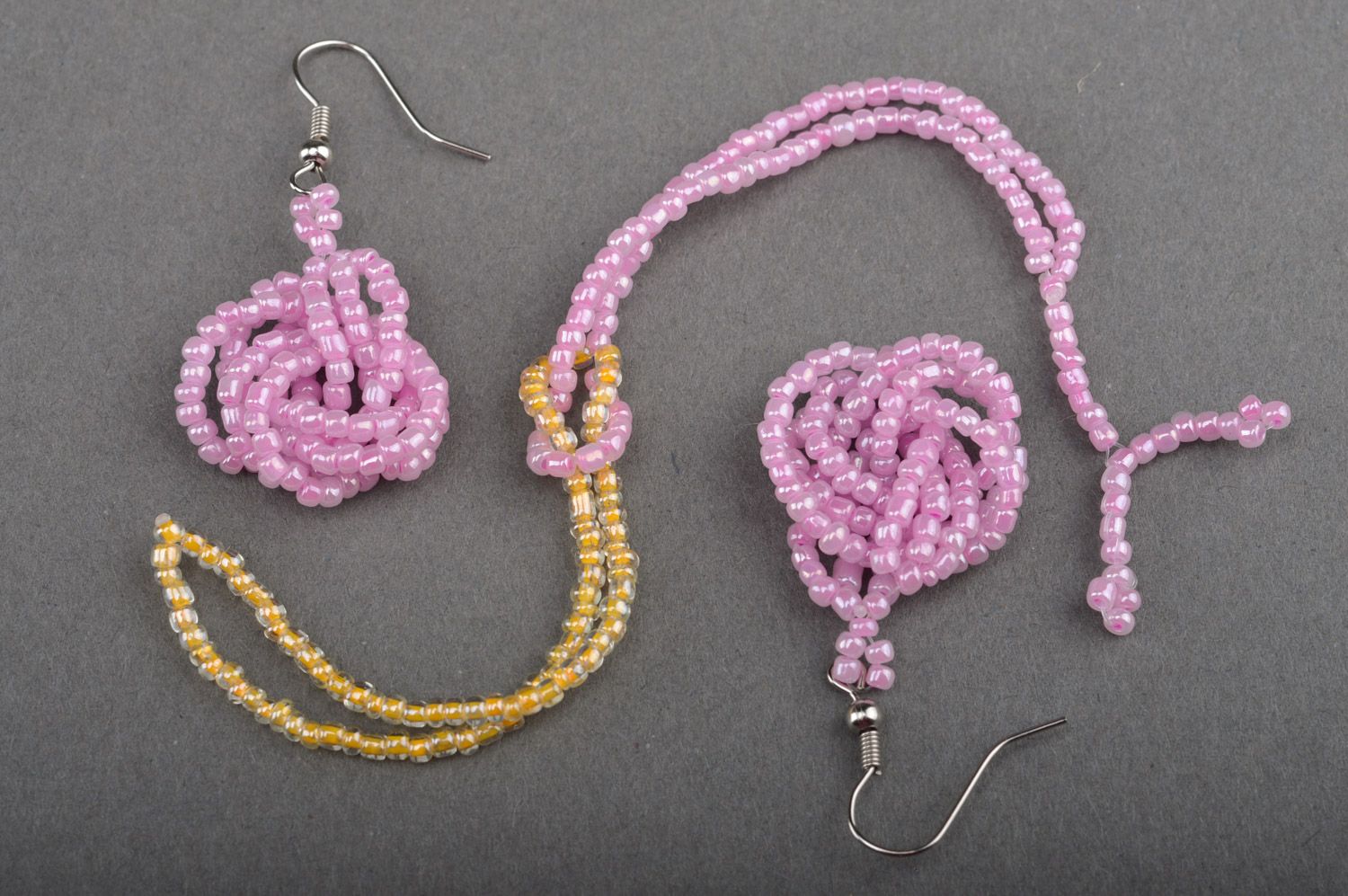 Handmade beaded jewelry set dangle earrings and wrist bracelet of pink color photo 2
