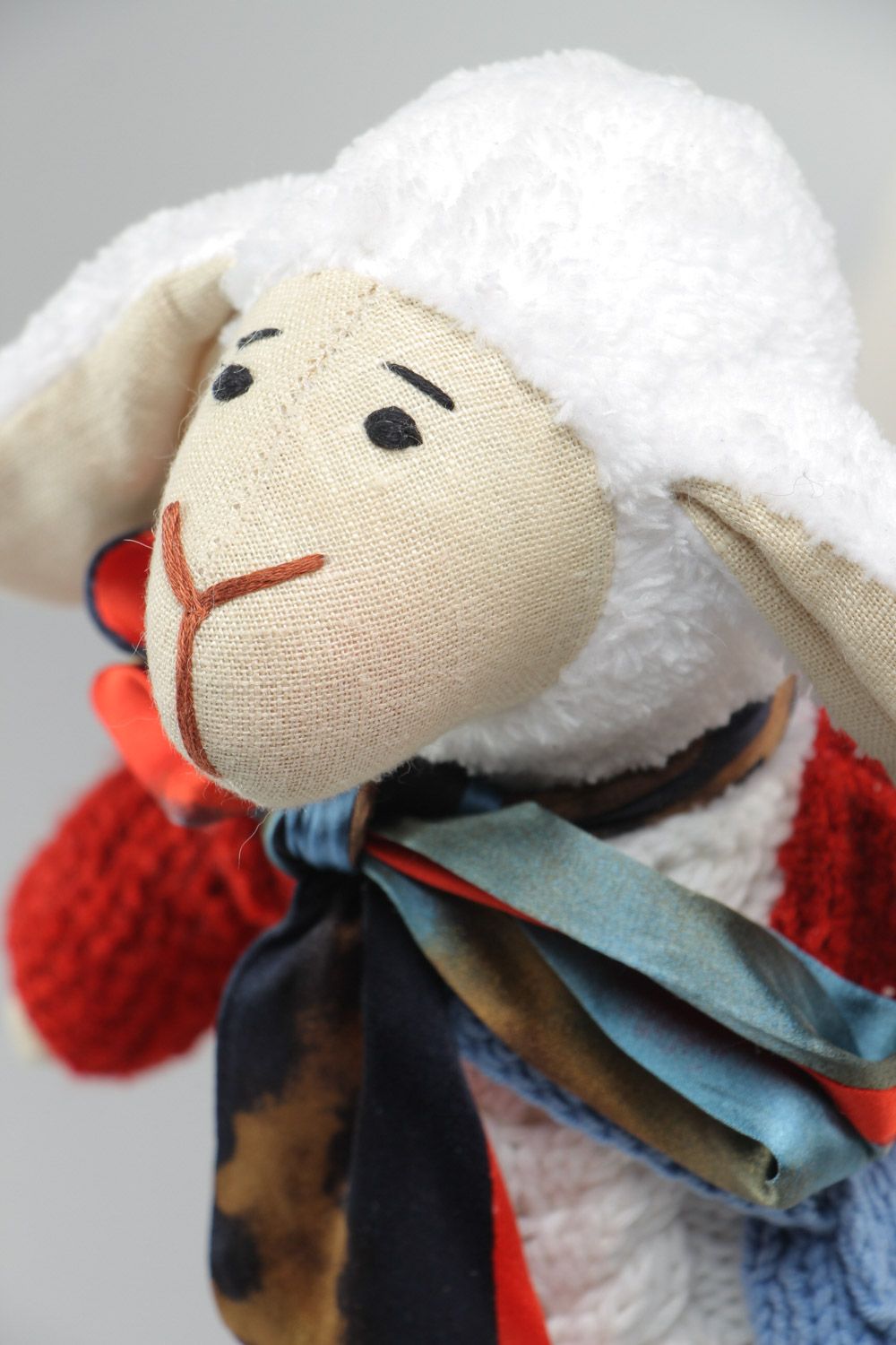 Handmade soft toy sewn of linen and plush fabrics Lamb in red knitted sweater photo 3