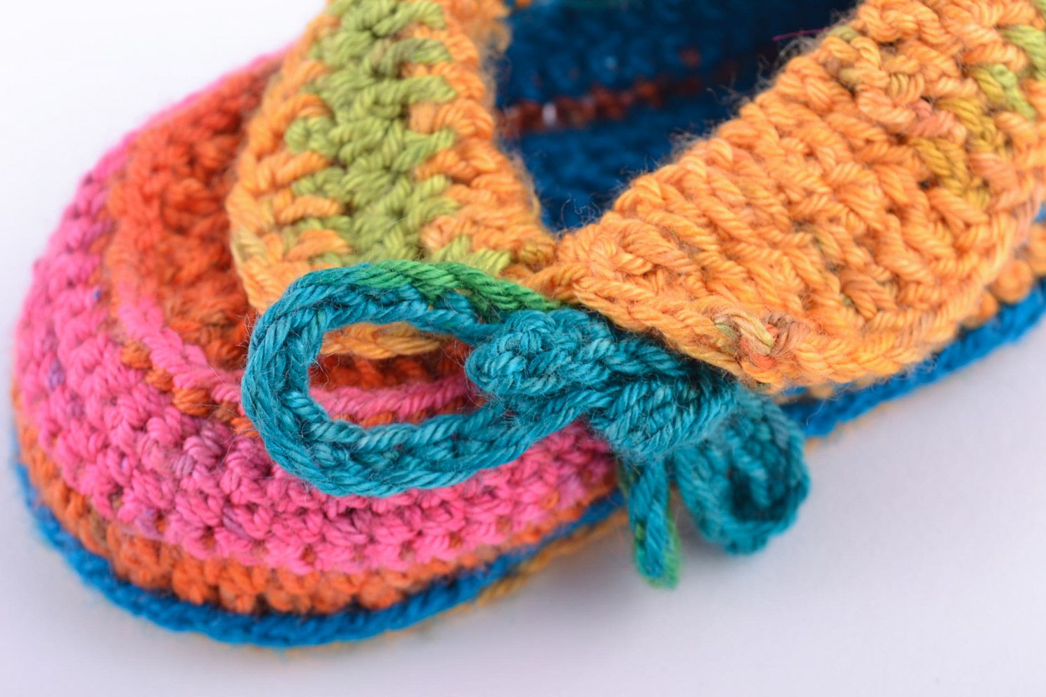Bright colorful handmade warm baby shoes crocheted of natural wool for kids photo 3