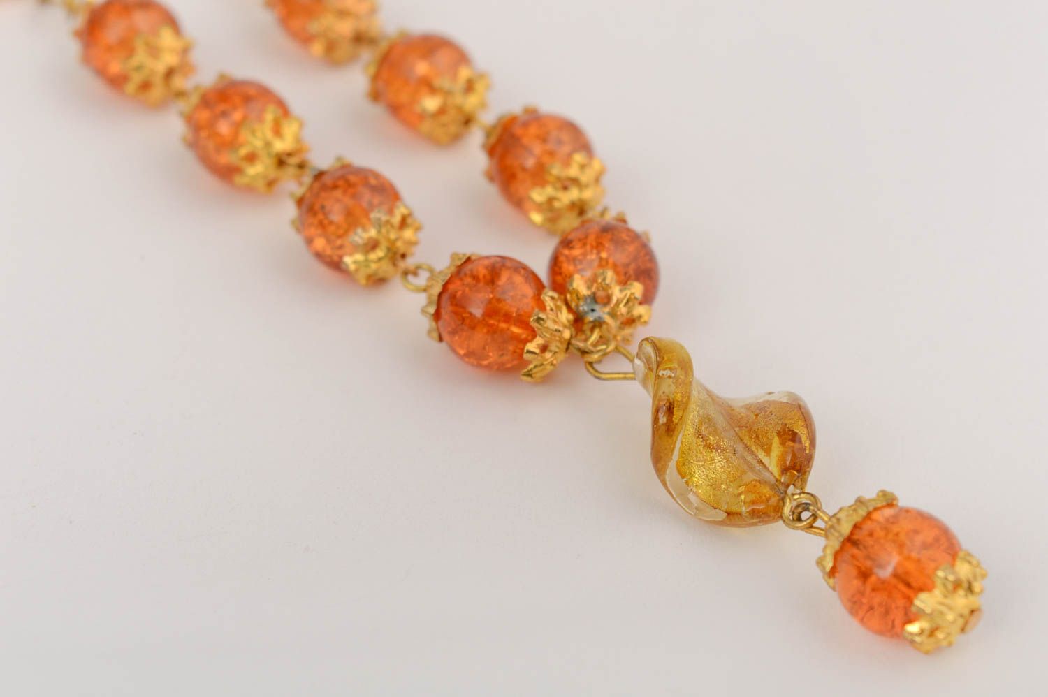 Handmade designer necklace with Venetian glass on metal chain in amber color photo 2