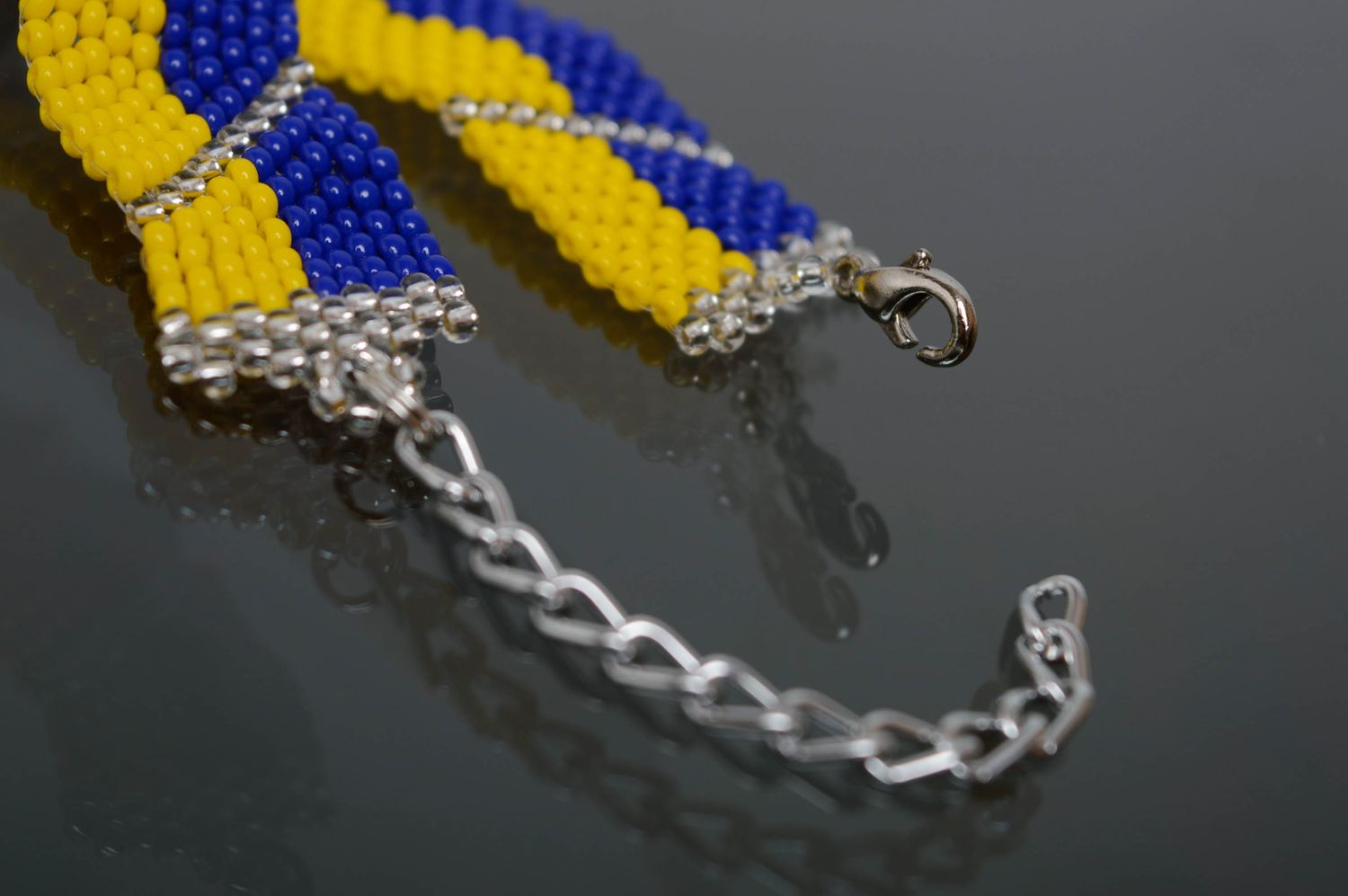 Yellow and blue handmade beaded bracelet with chains photo 3