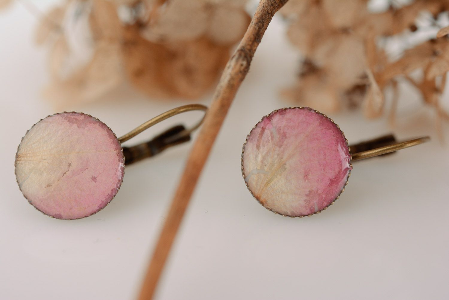 Tender pink round earrings with petals in epoxy resin for girls homemade photo 1