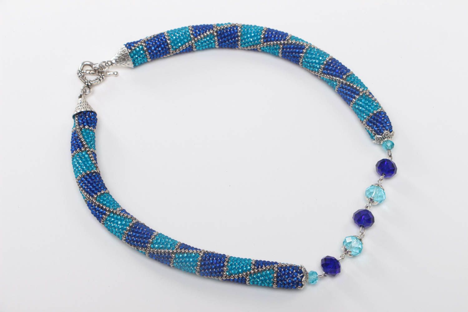 Handmade stylish beaded cord necklace in blue color palette with faceted beads photo 2