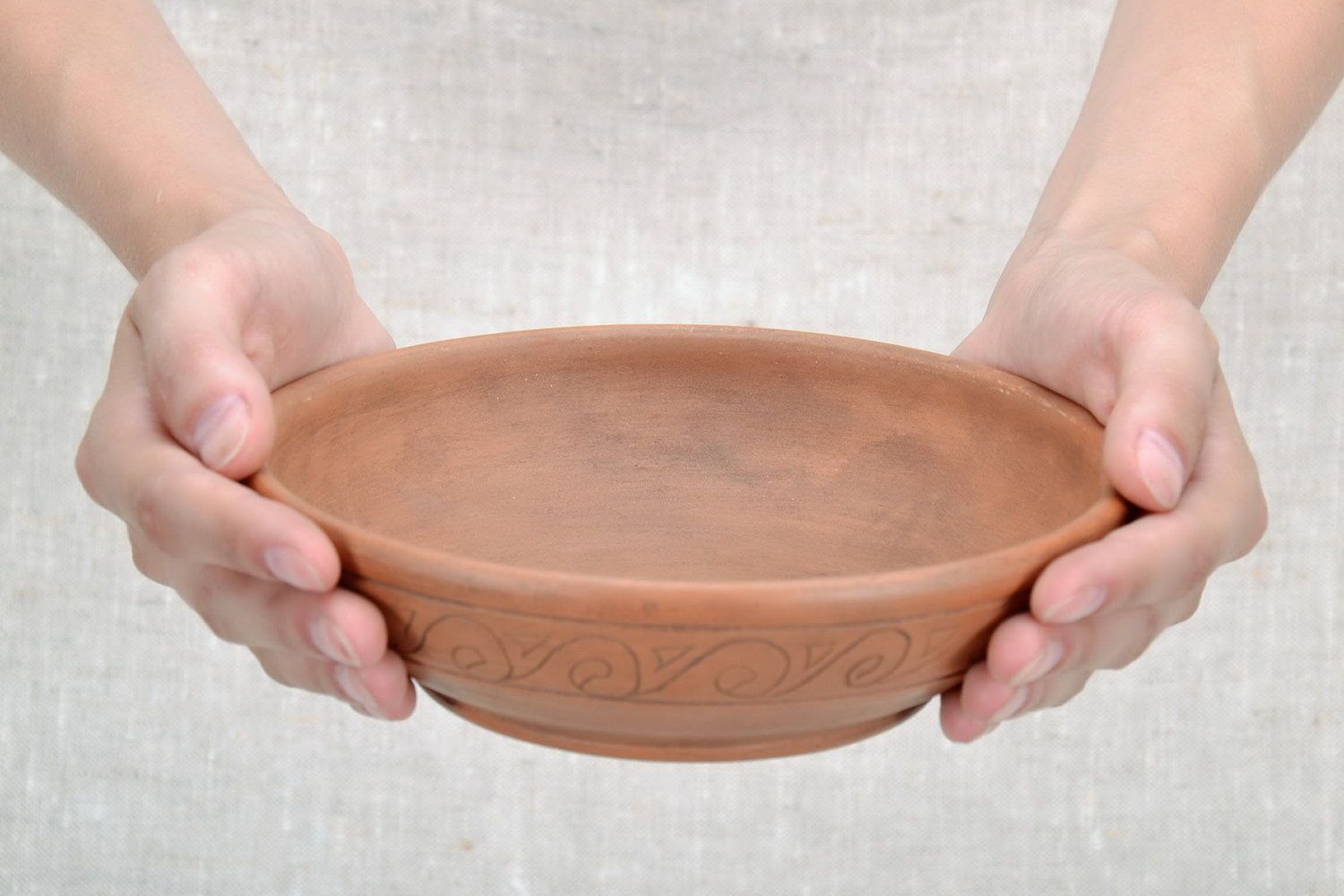 Clay bowl with an ornament photo 5