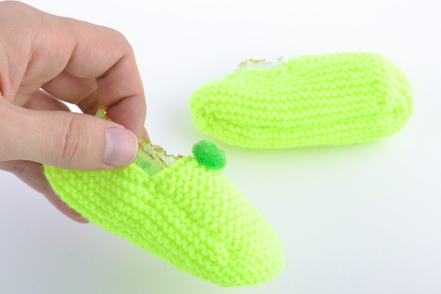 Beautiful light hand knitted wool slippers of lime color photo 2
