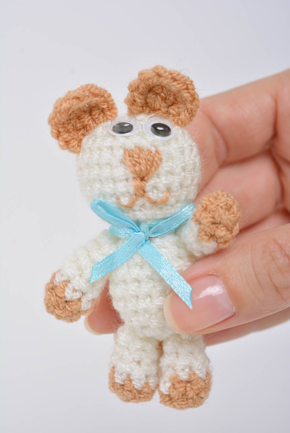 Small white children's handmade soft toy cat crocheted of acrylic threads photo 4