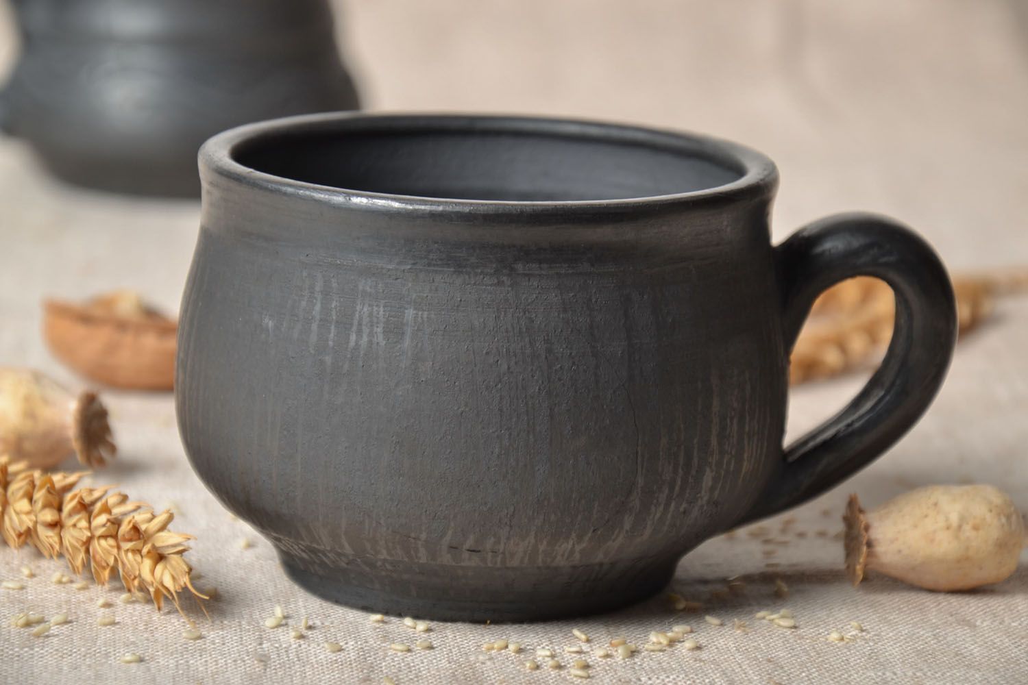 Tasse à thé en céramique noire enfumée photo 1