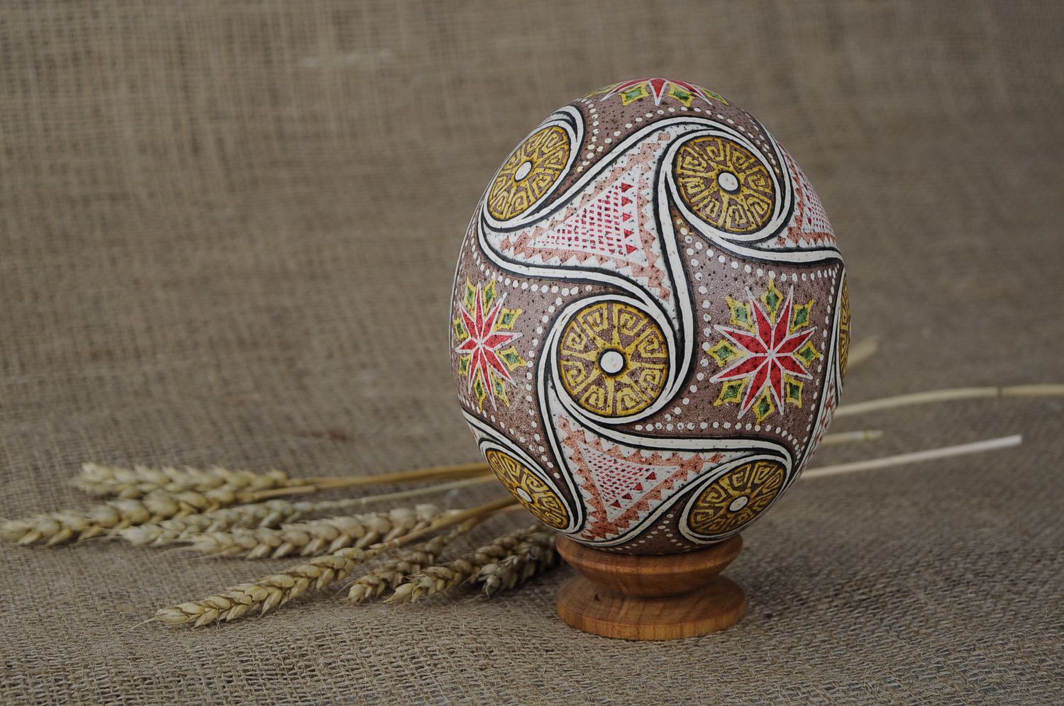 Easter egg painted with hot wax Suastica with triquetrums photo 1