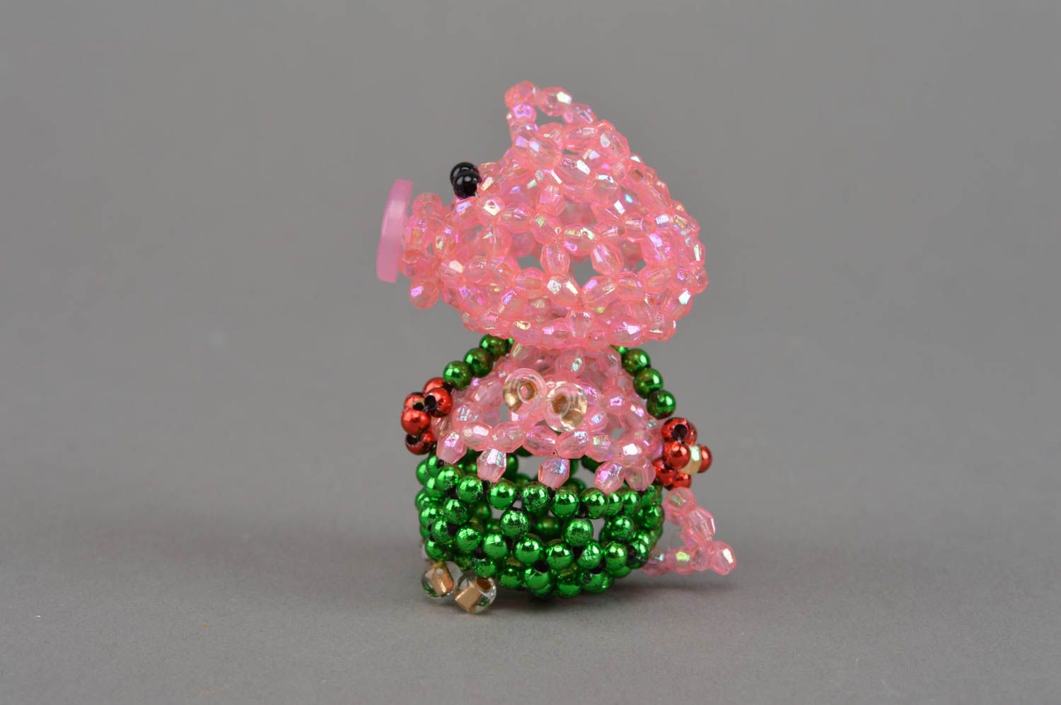 Small handmade designer pink beaded figurine of pig in green pants home decor photo 3