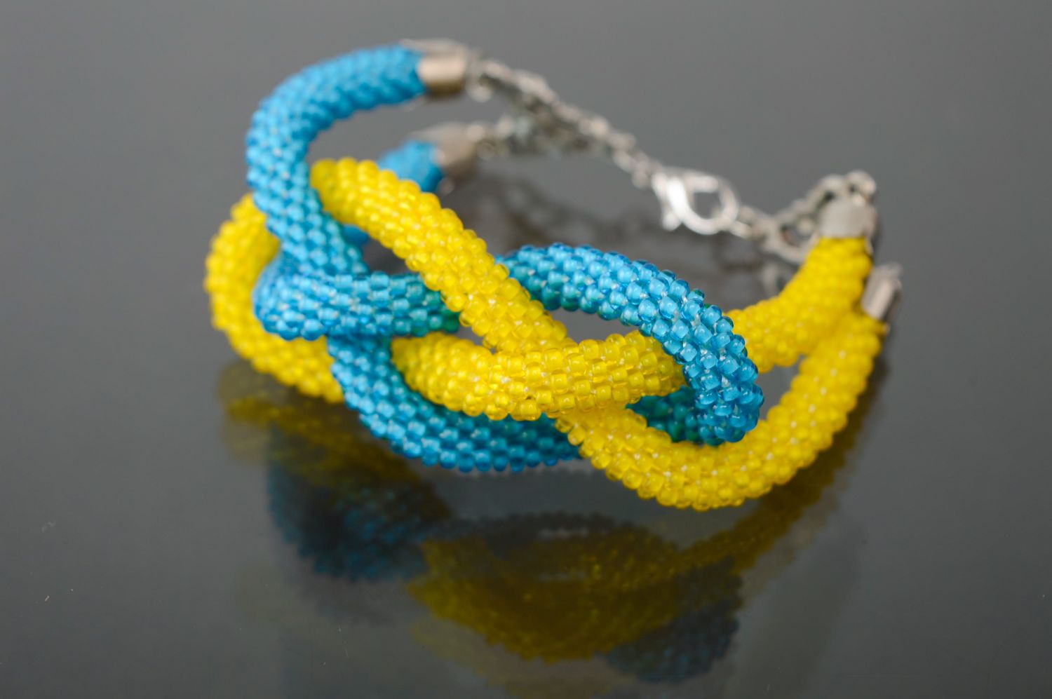 Bracelet tressé en perles de rocaille Jaune-bleu photo 1