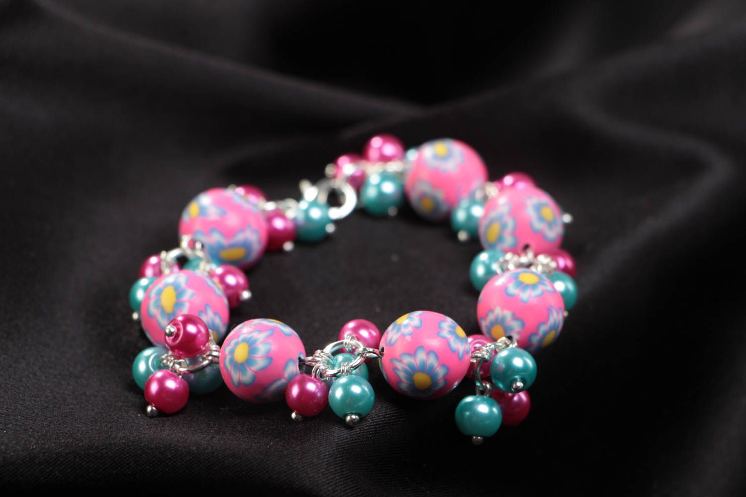 Beautiful bright handmade children's bracelet with plastic and ceramic beads photo 1